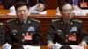 中共中央军委原政治工作部主任张阳（左）与中共中央军委原联合参谋部参谋长房峰辉在北京人大会堂参加全国人大会议。（2017年 3月8日）