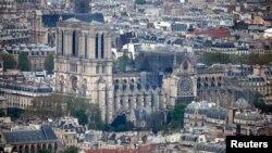 2019年4月16日,在发生大规模火灾后,巴黎圣母院大教堂的一部分遭到破坏。