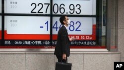 东京指数前一天(2018年6月18日)已经走低(美联社)