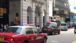 香港中环抗争者以“过马路”形式堵路声讨警暴 香港中环抗争者以“过马路”形式堵路声讨警暴