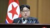 Північнокорейський лідер Кім Чен Ин під час виступу на партійному зібранні, Пхеньян, КНДР, 15 січня 2024. (Photo by KCNA VIA KNS / AFP)