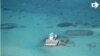 FILE - In this photo taken Feb. 28, 2013 by a surveillance plane, and released Thursday, May 15, 2014, by the Philippine Department of Foreign Affairs, Chinese-made structures stands on the Johnson Reef.