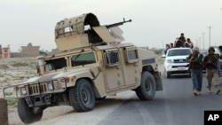 阿富汗保安部队在喀布尔以北的城市昆都士巡逻。 (2015年9月29日)