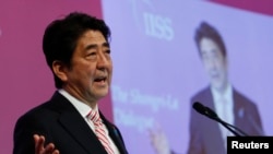 日本首相安培在新加坡召开的第十三届亚洲安全峰会发表开幕演讲(2014年5月30)