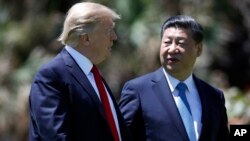 အမေရိကန်သမ္မတ Donald Trump နဲ့တရုတ် သမ္မတ Xi Jinping တို့ ဧပြီလတုန်းက တွေ့ဆုံစဉ်