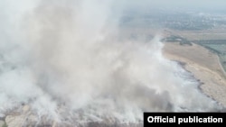 dumping site fire in Hlain Thaya Township