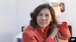 被打致残的维权律师倪玉兰资料照