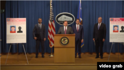 美国司法部官员宣布起诉两名与中国政府有关的黑客。(2020年7月21日)