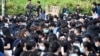 香港中學生組織估計有2,000至3,000人參與8月22日中學生罷課集會，警方則表示，集會高峰期有1,510人參與。（美國之音 湯惠芸）