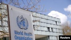 资料照片;日内瓦世界卫生组织大楼外的世卫组织标志。