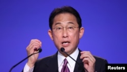 日本首相岸田文雄在联合国气候变化会议上讲话(路透社2021年11月2日)REUTERS/Hannah McKay/Pool