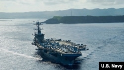 美军“罗斯福”号(USS Theodore Roosevelt)航母2020年5月21日驶离关岛,前往菲律宾海执行任务。
