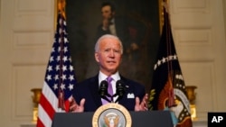 美国总统拜登2021年1月26日在白宫发表讲话(美联社)