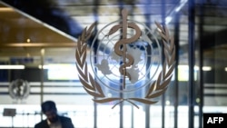 资料照片:世界卫生组织日内瓦总部的世卫组织标志。(2020年1月12日)