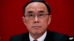 中国电信公司董事长兼中共党组书记常小兵2013年在香港的记者会上