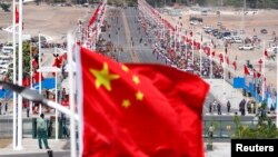 资料照:中国在巴布亚新几内亚举行一个中国援建项目竣工仪式。(2018年11月16日)