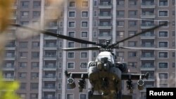 အမေရိကန်ဆီကနေ ပိုလန်ကဝယ်ယူမယ်ဆိုတဲ့ AH-64E Apache အမျိုးအစား တိုက်ရဟတ်ယာဥ်။ (ယခင်မှတ်တမ်းဓာတ်ပုံ)