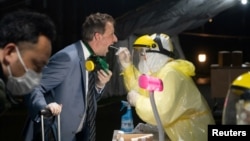 一名抵达上海国际机场的澳大利亚旅客。(2020年3月21日)