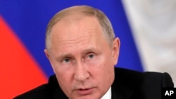 2018年10月3日俄罗斯总统普京在圣彼得堡的国家艾尔米塔日博物馆发表演讲。