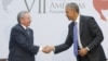 US President Barack Obama and Cuban President Raul Castro shake hands during their meeting at the Summit of the Americas in Panama City, Panama, April 11, 2015.