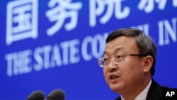 中国商务部副部长王受文在记者会上介绍《关于中美经贸磋商的中方立场》白皮书。(2019年6月2日)