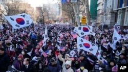 韩国2024年第四季度经济增长低于预期,主要归因于戒严事件造成的消费和建筑工程市场萎缩。(美联社:2025年1月23日)