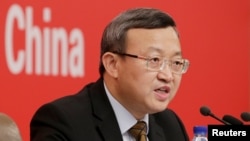 资料照:中国商务部副部长王受文