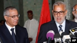 利比亚总理扎伊丹(左)。