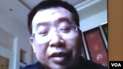 刚获释的中国维权律师江天勇(金变玲微信视频截图)