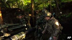 Українські військовослужбовці у Донецькій області, 7 травня 2024 р. AP/Francisco Seco