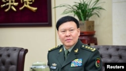 2014年1月13日,时任中国军队总政治部主任张阳在北京出席会议。