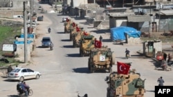 土耳其装甲车2019年3月8日在叙利亚北方边境地区巡逻。