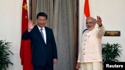 印度总理莫迪在新德里会晤中国国家主席习近平。(2014年9月18日)