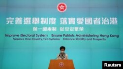 香港特首林郑月娥在周四记者会上谈论中国人大改变习惯立法会选举制度。(2021年3月11日)