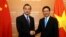 Ủy viên Quốc vụ-Ngoại trưởng Trung Quốc Vương Nghị (trái) bắt tay Phó thủ tướng-Bộ trưởng Ngoại giao Việt Nam Phạm Bình Bình trong một chuyến thăm Hà Nội .